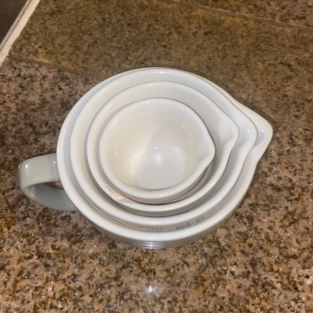 Creative Co-Op ceramic measuring cups. 1 1/2 cup, 1 cup, 1/2cup, and 1/4 cup